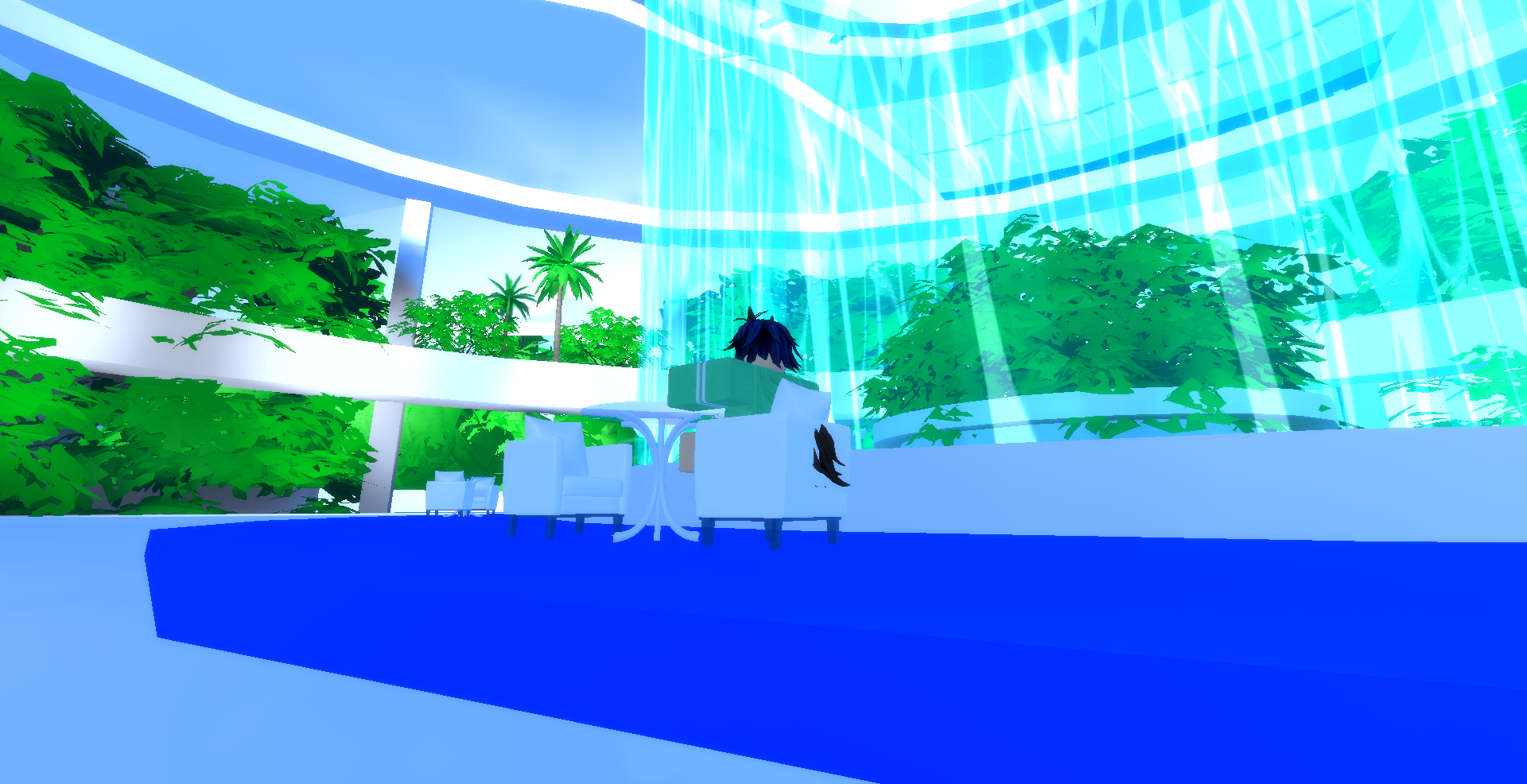 my robloxian sitting on a white and blue chair at a small table next to an indoor waterfall
